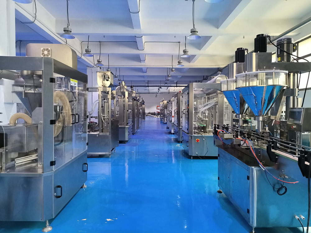 全自動(dòng)粉劑灌裝機(jī)、液體灌裝機(jī)車間